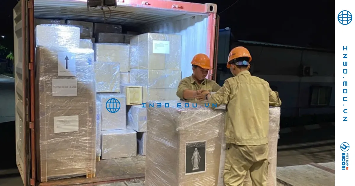 CT3D team loading crated finished products into a shipping container for export