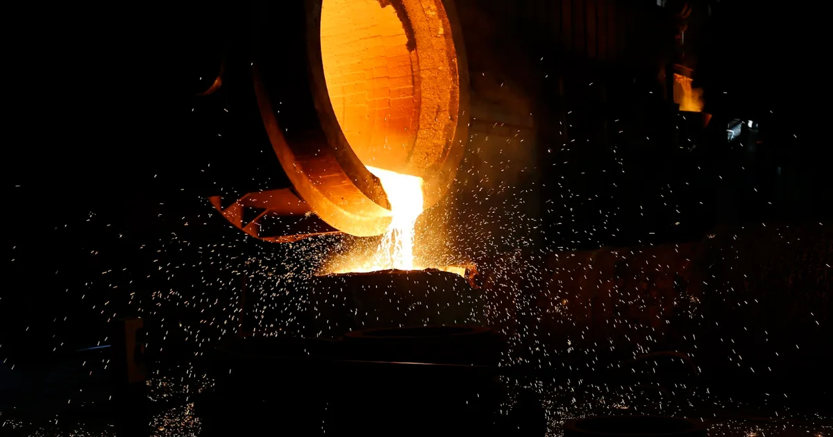 Molten metal being poured into a container – metal casting where internal porosity can form